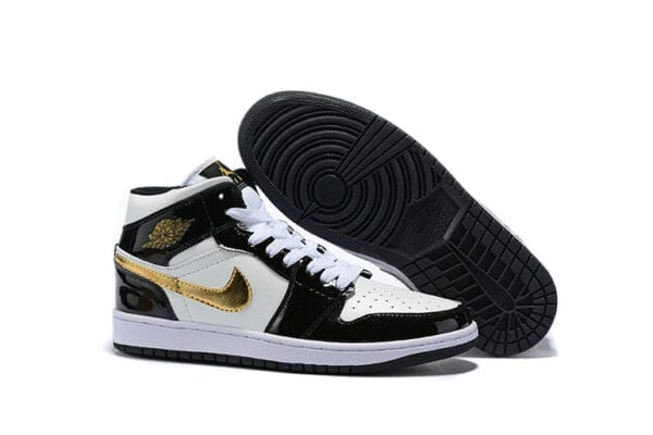 Nike Air Jordan 1 Negras y Doradas - Imagen 2